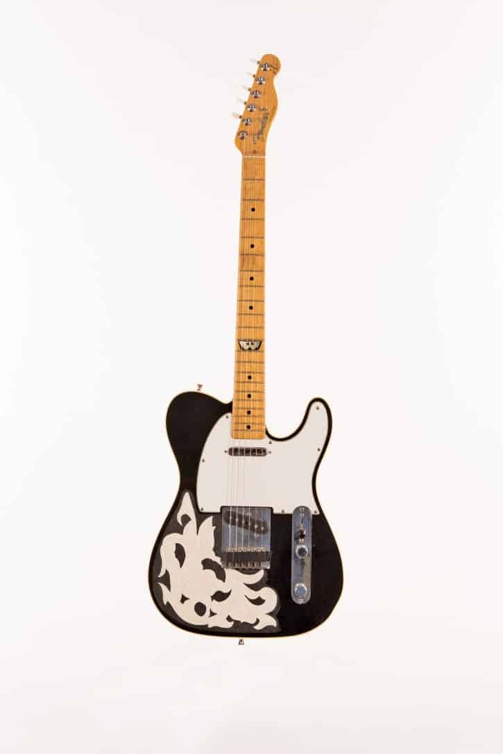 This Telecaster was built for Waylon Jennings by the Fender Custom Shop in the early 1990s. Modeled after his 1963 Telecaster, it features a leather white rose inlay on the body; Waylon’s Flying W logo inlaid at the twelfth fret; his signature on the headstock; and a Scruggs/Keith tuner on the low E string. This instrument was the prototype for Fender’s Waylon Jennings Tribute Series, introduced in 1995. Courtesy of Jessi Colter (Photo Bob Delevante, courtesy Country Music Hall of Fame & Museum)