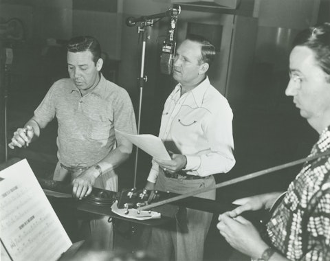 Carl Cotner, Gene Autry, and Johnny Bond in the recording studio