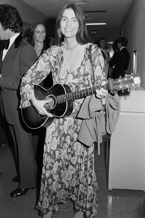 Emmylou Harris, backstage at the CMA Awards, 1976. Photo by Raeanne Rubenstein.