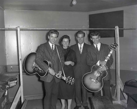 All grown up with their parents, late 1950s. From left: Phil, Margaret, Ike, and Don. Photo by Elmer Williams.