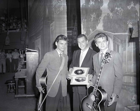 With Grand Ole Opry manager “D” Kilpatrick at the Opry, late 1950s. The Everly Brothers became members of the Opry on June 1, 1957. Photo by Elmer Williams.