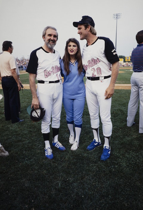 Ralph Emery with singer Sylvia and former Pittsburgh Steelers quarterback Terry Bradshaw at the 1983 Fan Fair softball game between Barbara Mandrell’s Do-Rites and Conway Twitty’s Twitty Birds. Photo by Raeanne Rubenstein.