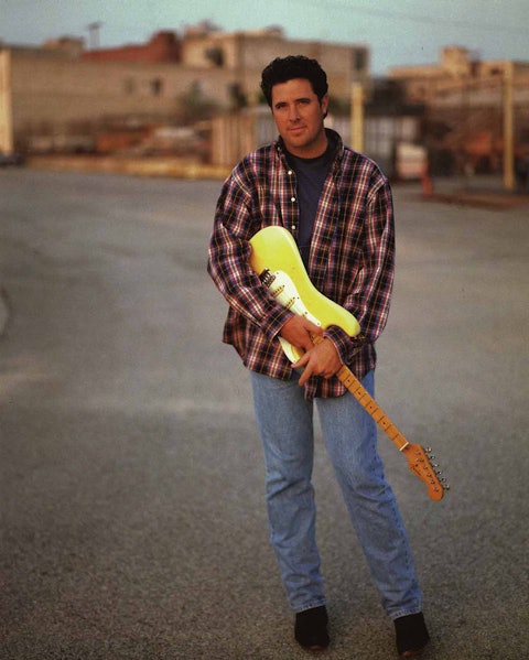 Caption: Vince Gill, early 1990s. Photo by Walden S. Fabry Studios.