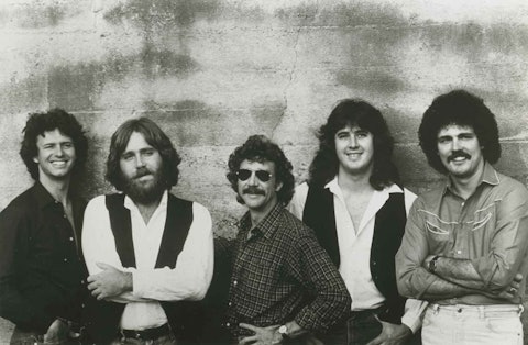 Caption: Pure Prairie League, c. 1979. From left: Jeff Wilson, Michael Connor, Billy Hinds, Vince Gill, and Michael Reilly