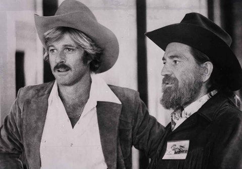 Robert Redford and Willie Nelson on the set of Electric Horseman, 1979. Photo by Walden S. Fabry Studios.
