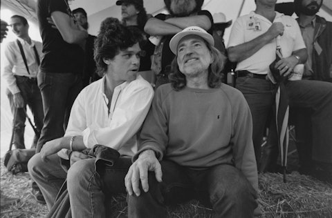 John Mellencamp and Willie Nelson at Farm Aid in Champaign, Illinois, 1985. Photo by Raeanne Rubenstein.