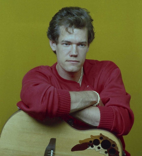Randy Travis in a November 1986 publicity photo, within days of his second #1 hit, “Diggin’ Up Bones,” topping the charts. Photo by Walden S. Fabry Studios.