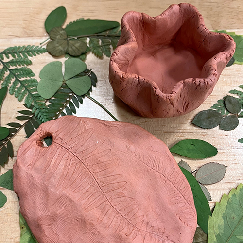 Family Program: Earth Day Clay Craft. Photo of a crafted clay bowl and plate.