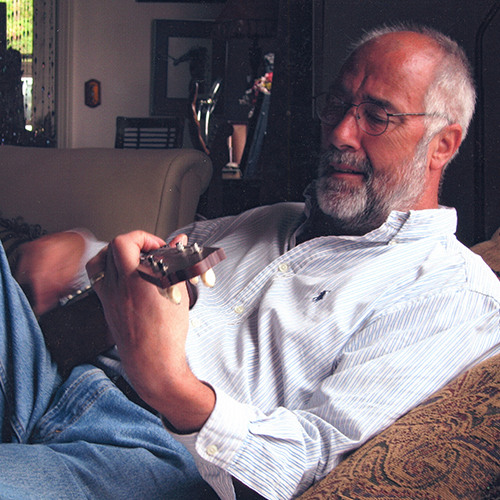 Photo of Roger Cook playing the classical guitar