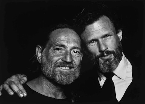 Willie Nelson and Kris Kristofferson in a promotional photo for the film Songwriter, 1984. Photo by Walden S. Fabry Studios.