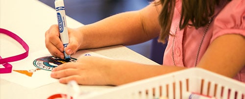 Hands coloring with a marker