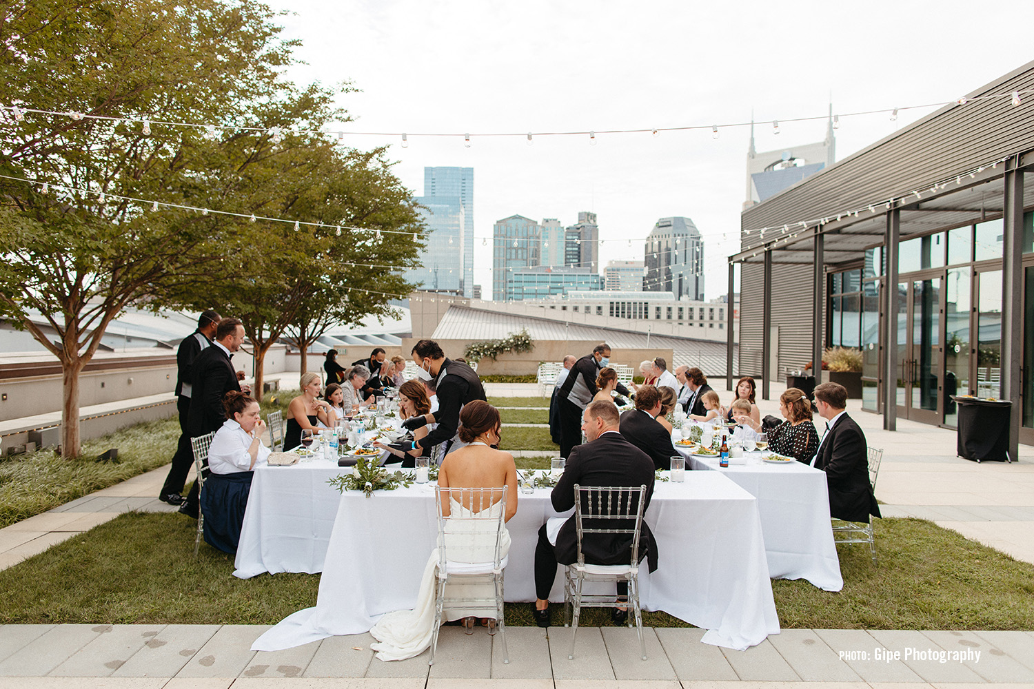 View of wedding on the Carlton Terrance overlooking downtown Nashville - downtown Nashville Wedding Venue