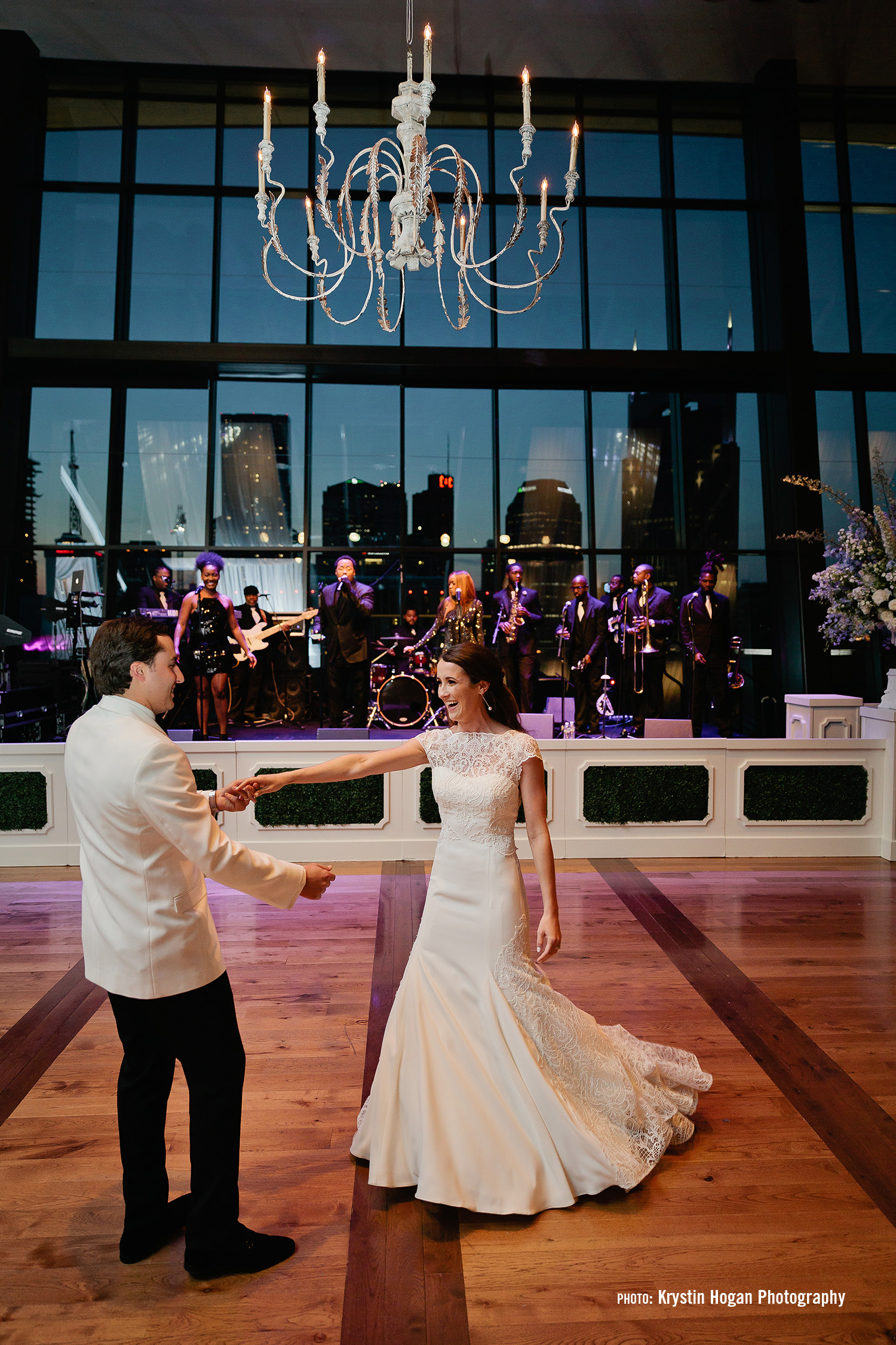 Couple dances in the Event Hall with the downtown Nashville skyline in the background enjoying this unique Nashville wedding venue.