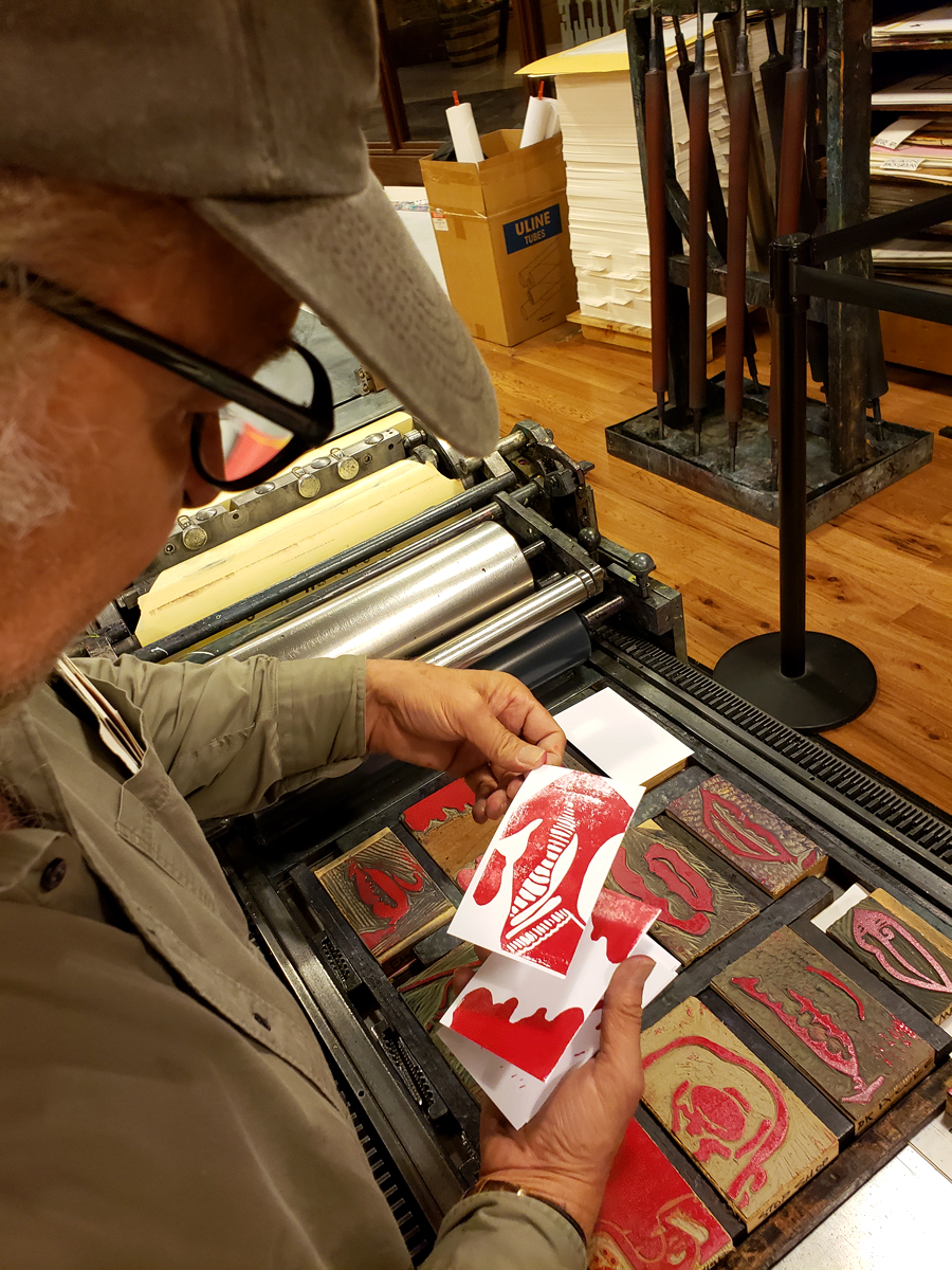 Jim holding some prints