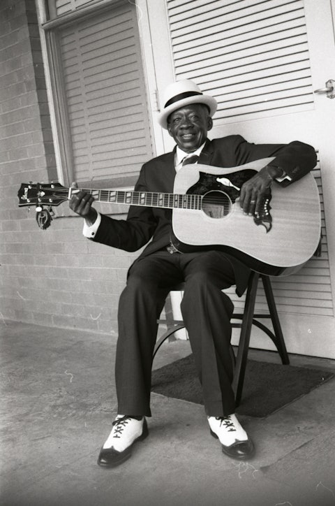 Deford Bailey with a Guitar