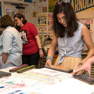 Woman smiling and printing