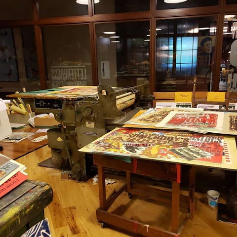 prints laid out on the table